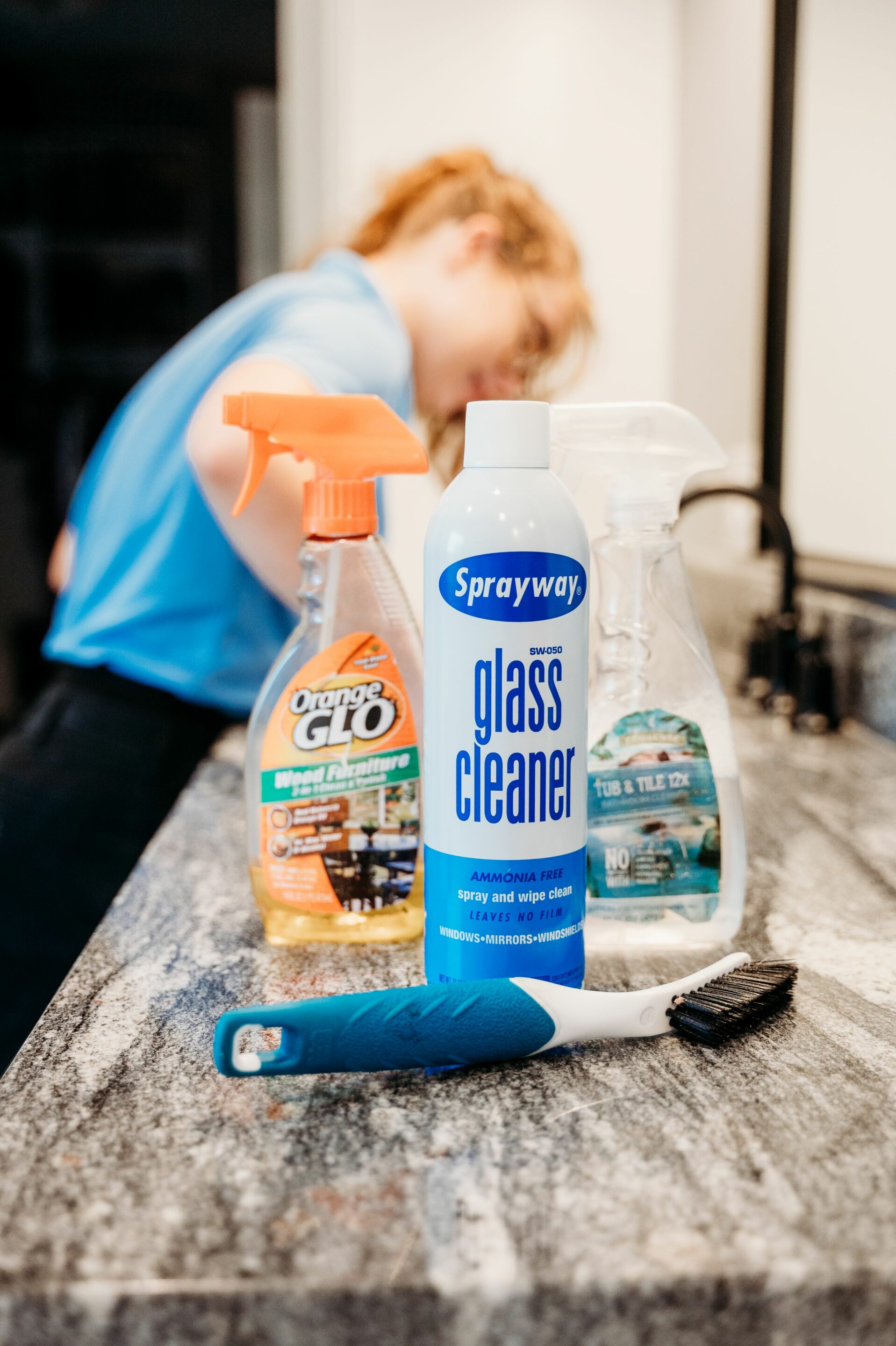 A Busted Knuckles beautification technician cleaning for a move-in/move-out cleaning service